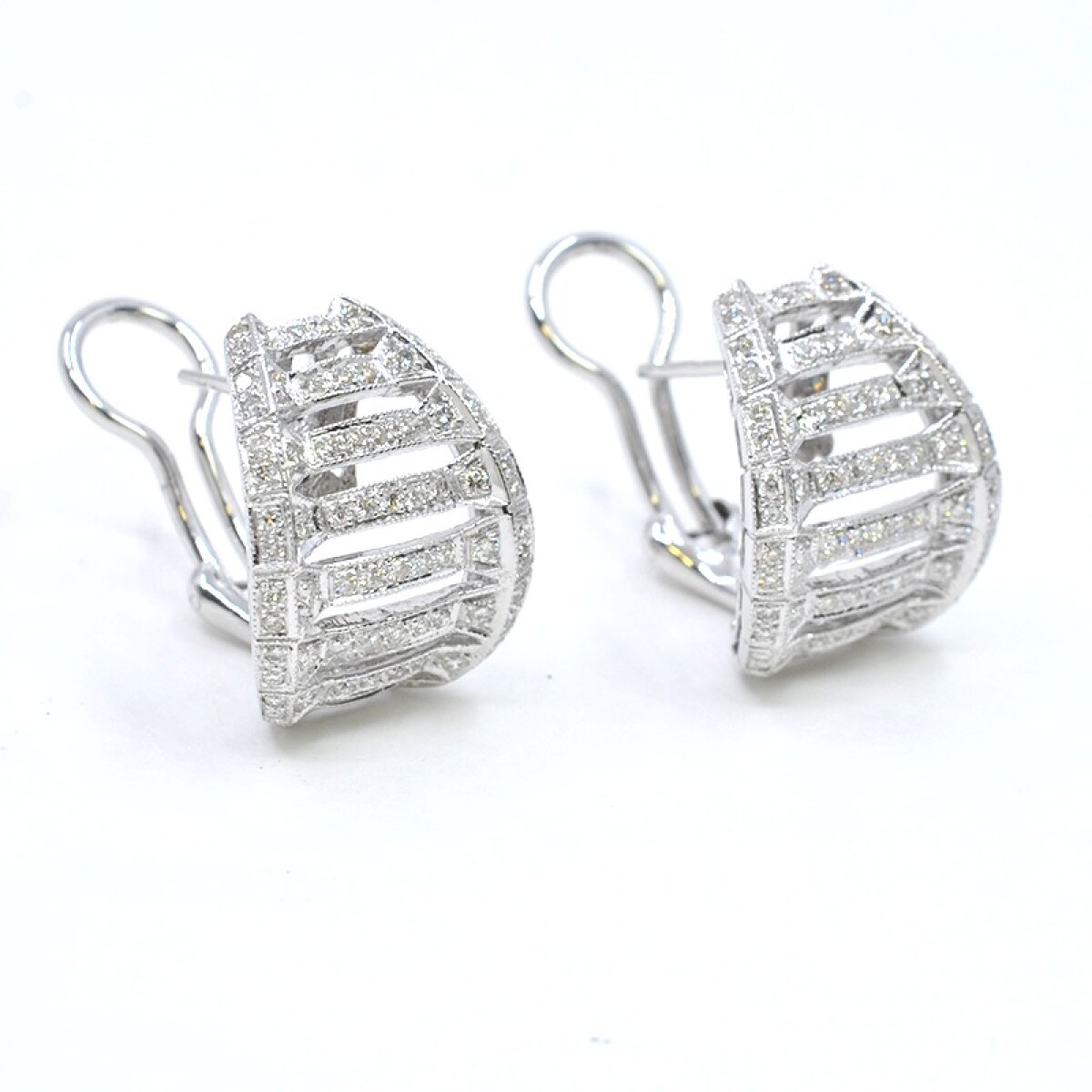 Caravanas clips caladas en oro 18k blanco, con brillantes 