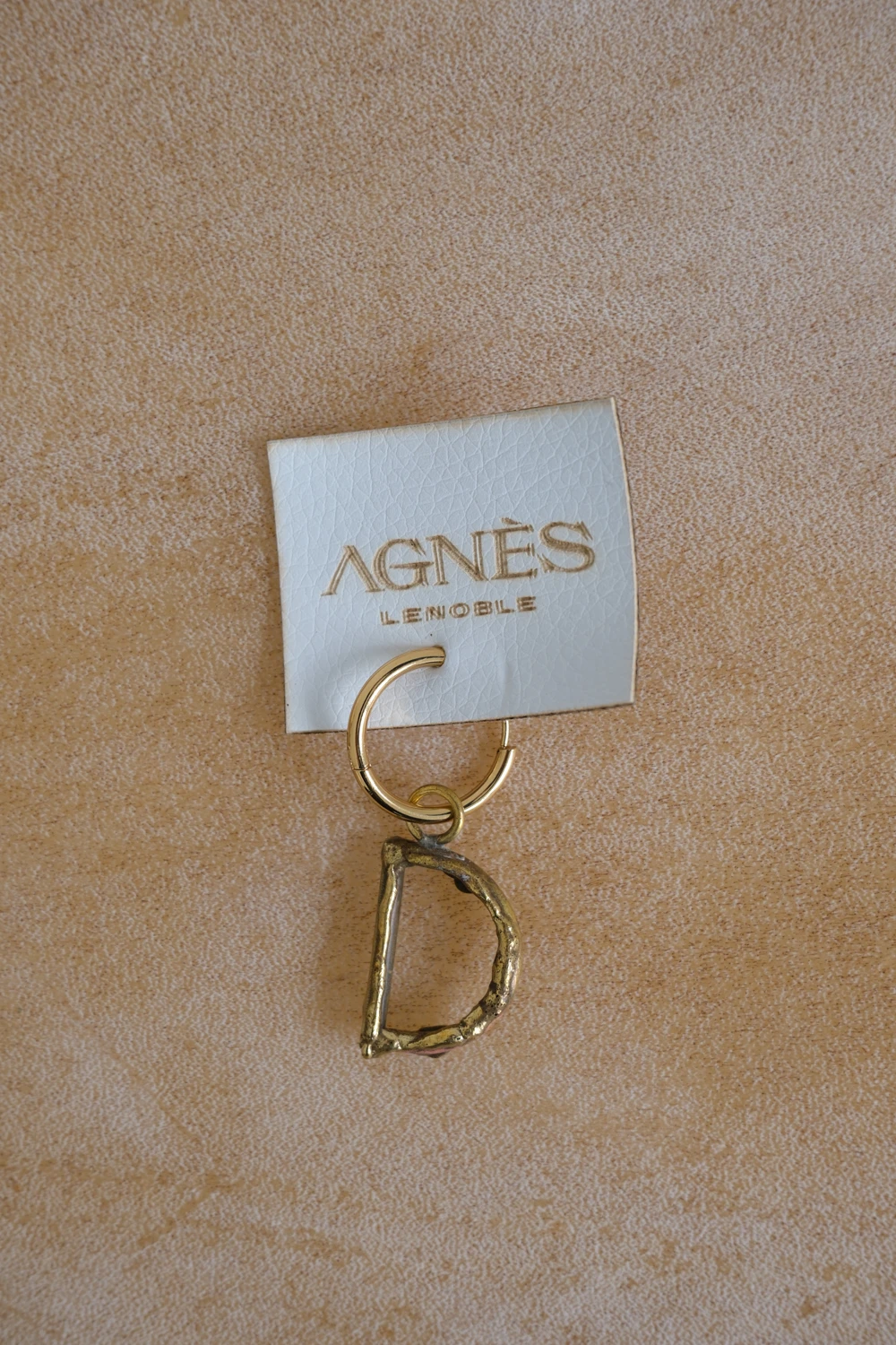 Spelling Earrings Bronce - D