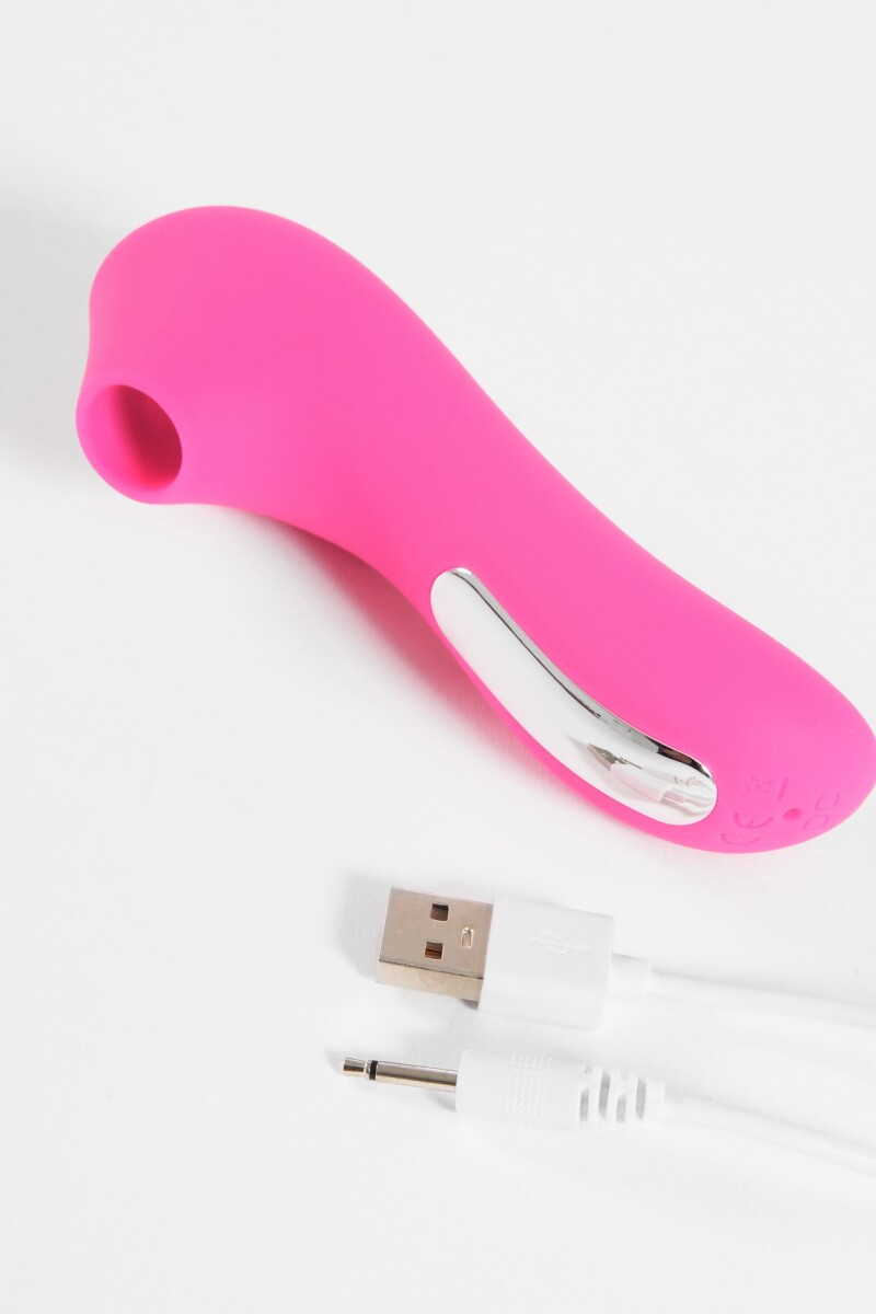 Succionador vibrador máxima potencia fucsia