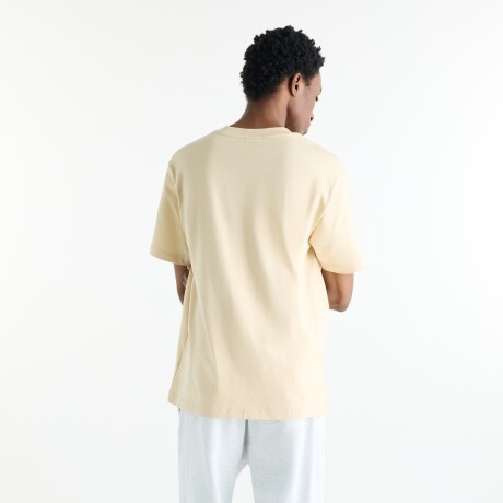 Remera New Balance de Hombre - Athletics - MT41533ABC BEIGE