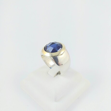 Anillo de plata 925 con detalles en double de oro 18Ktes, con circonia azul central 15mm, diámetro interno 18.5mm #17 Anillo de plata 925 con detalles en double de oro 18Ktes, con circonia azul central 15mm, diámetro interno 18.5mm #17