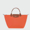 Longchamp -Cartera Longchamp plegable de nylon con cierre y asa corta, Le pliage M Naranja