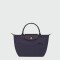 Longchamp -Cartera Longchamp plegable de nylon con cierre y asa corta, Le pliage green S Violeta