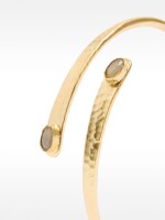 Pulsera Rígida Cruzada Con Detalles Ovalados dorado
