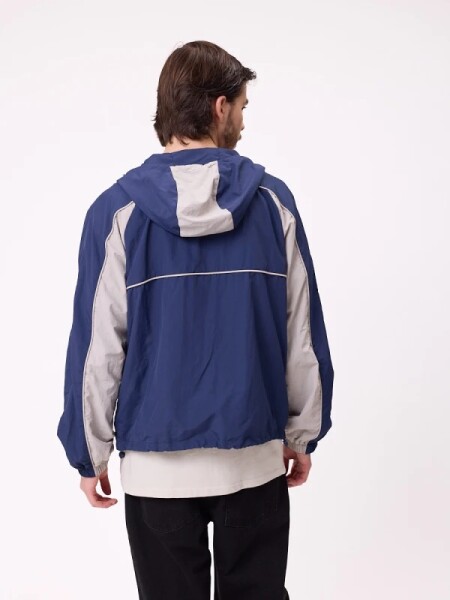 CAMPERA RUSTY COWARIE ROMPEVIENTOS AZUL