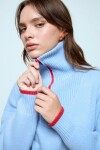 Sweater tejido con cierre celeste