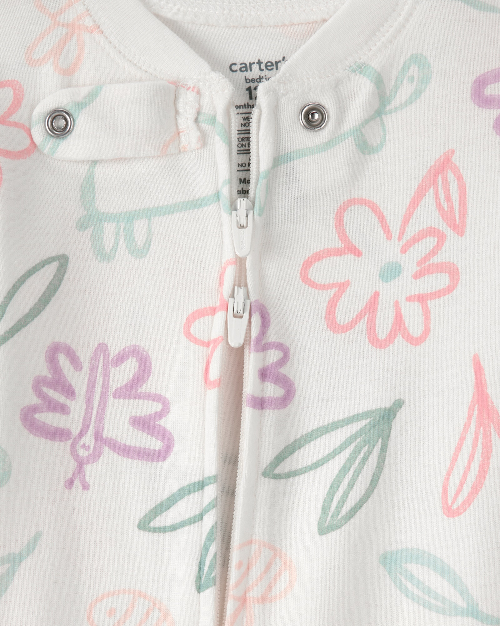 Pijama enterito de algodón con pie, diseño flores, tortugas y mariposas. Talles 12-24M Sin color