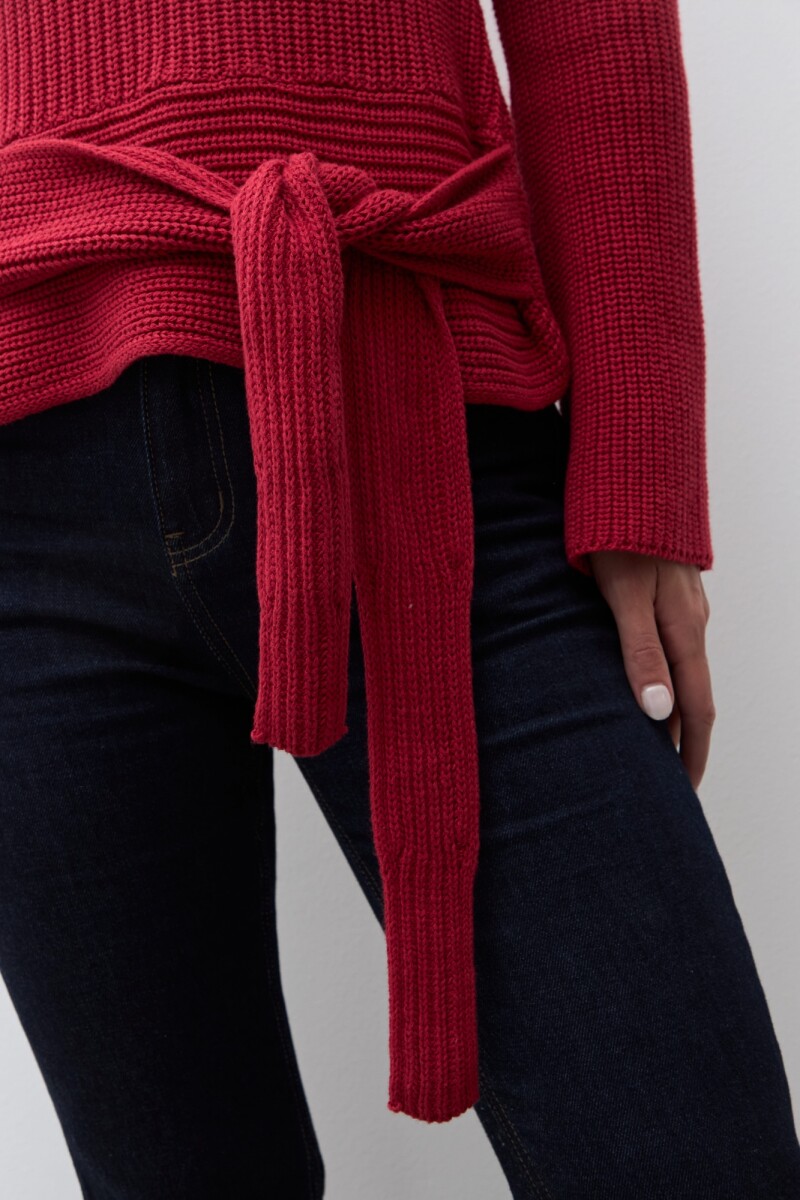 Sweater con lazo rojo