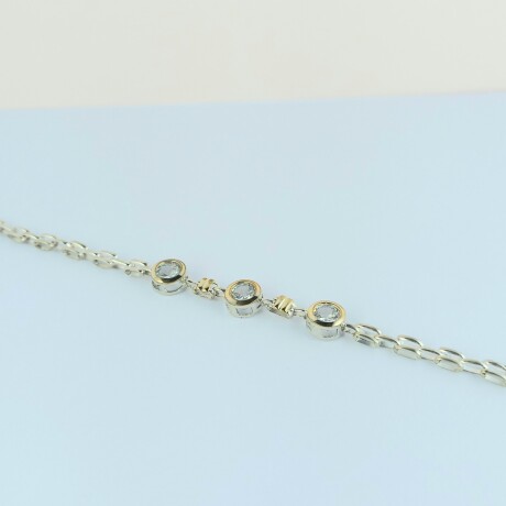 Pulsera de plata 925 y double en oro 18 ktes con circonias. Pulsera de plata 925 y double en oro 18 ktes con circonias.