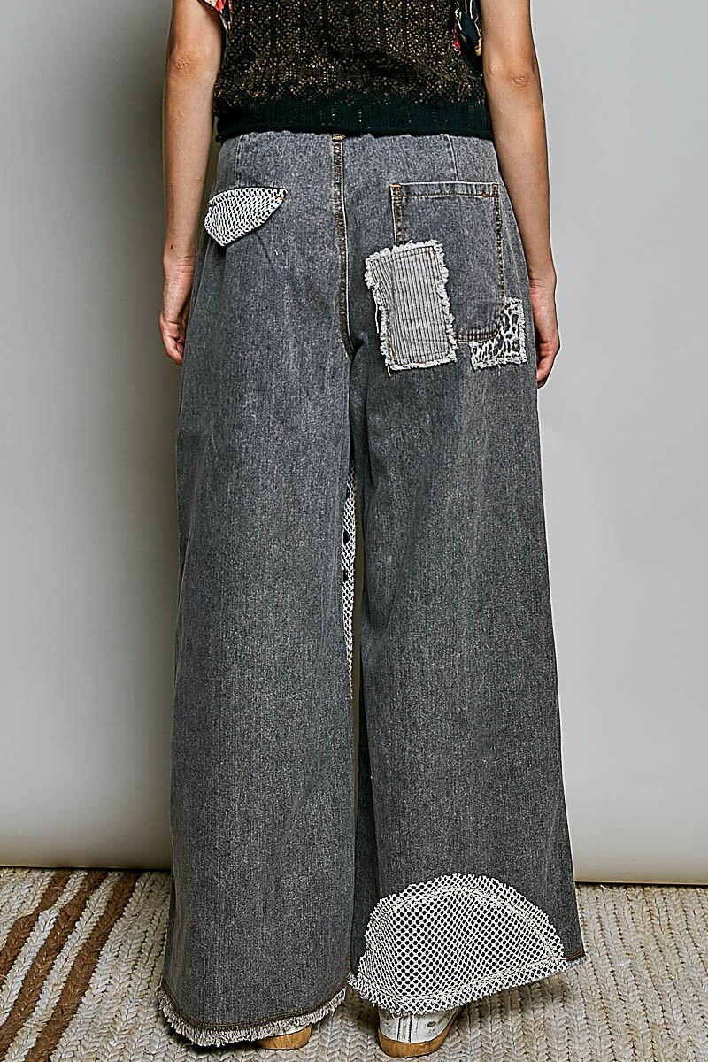PANTALON CON PARCHE Negro