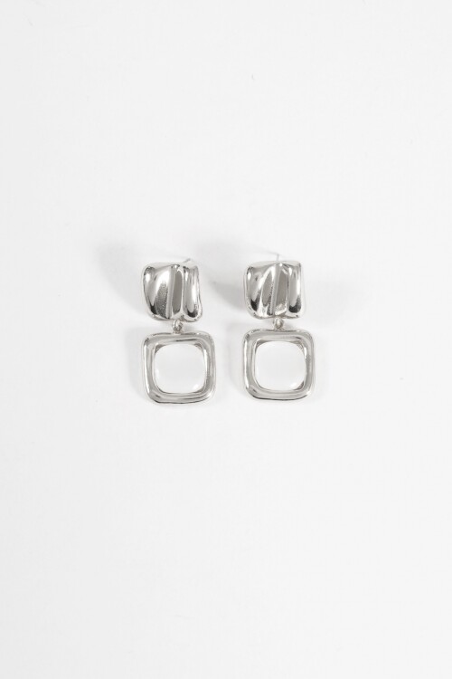 Caravanas metálicas dije nacarado plateado