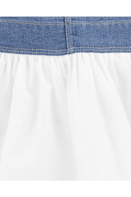 Jumper mixta de jean y falda de algodón con ojales Jumper mixta de jean y falda de algodón con ojales