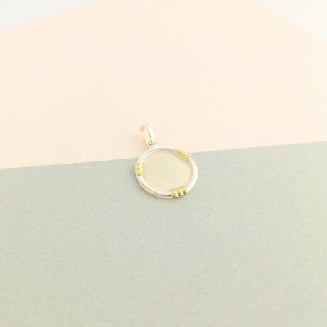 Medalla de plata 925 y double en oro 18 ktes. Medalla de plata 925 y double en oro 18 ktes.