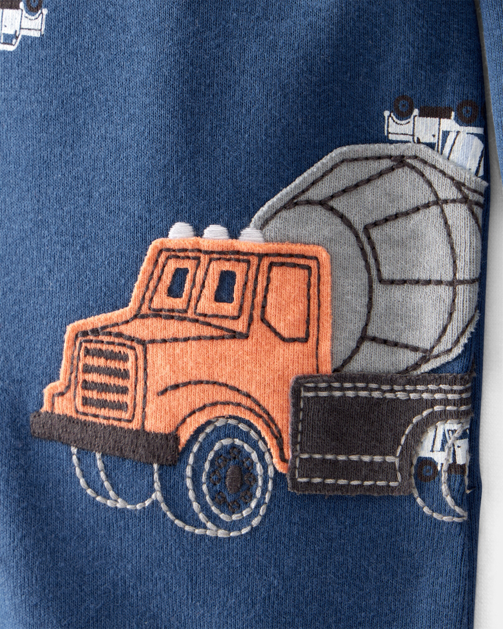 Pijama una pieza de algodón, con pie, diseño camiones de construcción Sin color