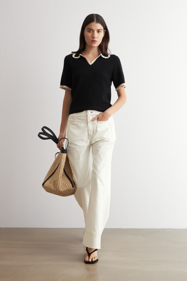 Sweater cuello polo manga corta negro