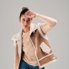Chaleco con sherpa Slowly Beige