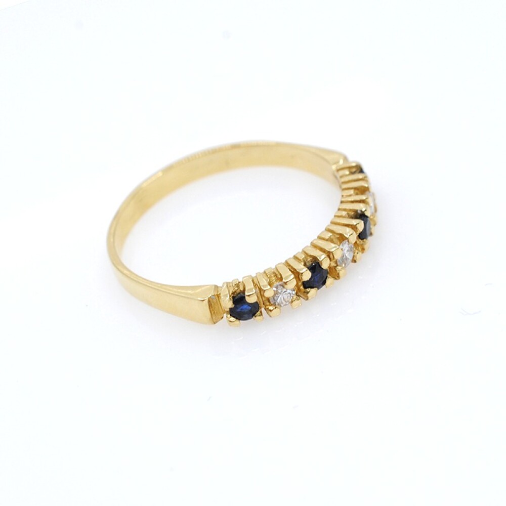 Anillo en oro 18k , brillantes y zafiros Anillo en oro 18k , brillantes y zafiros