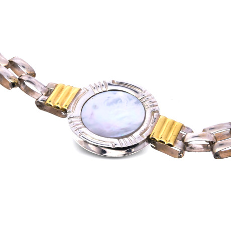 Pulsera de plata 925 y double en oro 18 ktes con nácar. Pulsera de plata 925 y double en oro 18 ktes con nácar.