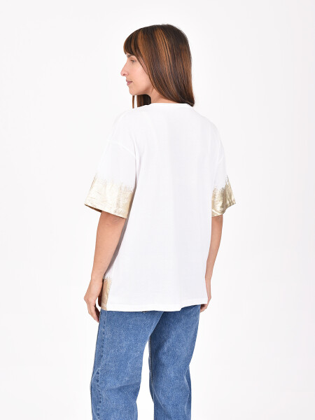REMERA LIEVE DORADO