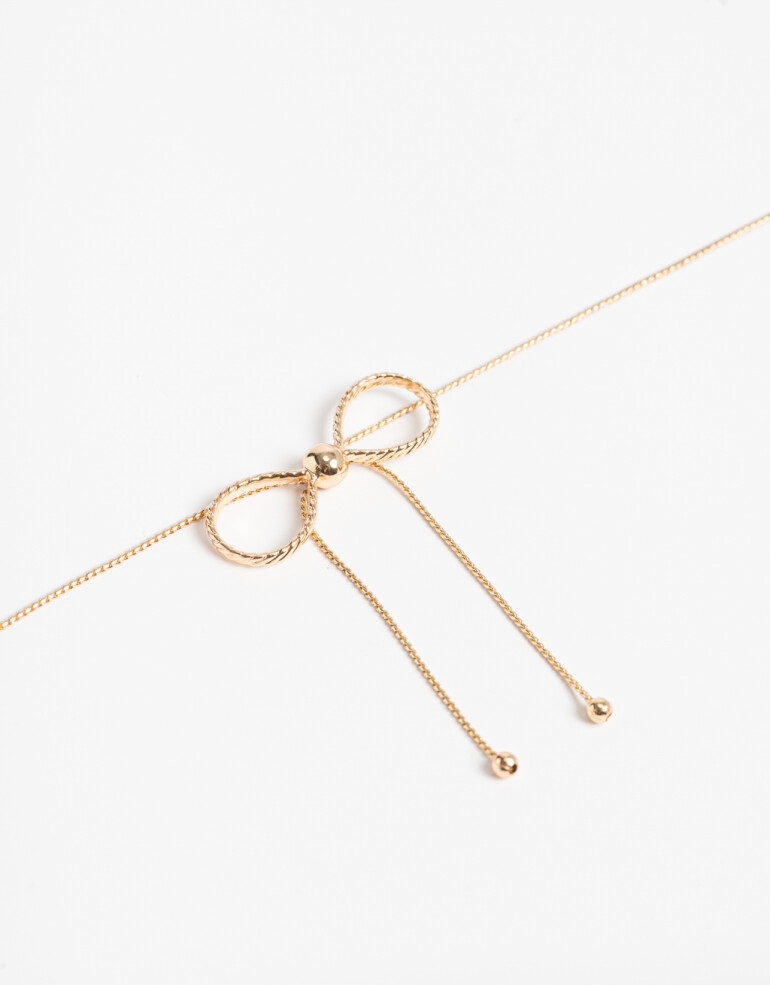 Cadena Corta con Dije Metal Collar Con Dije Moño Bañado En Oro - Dorado