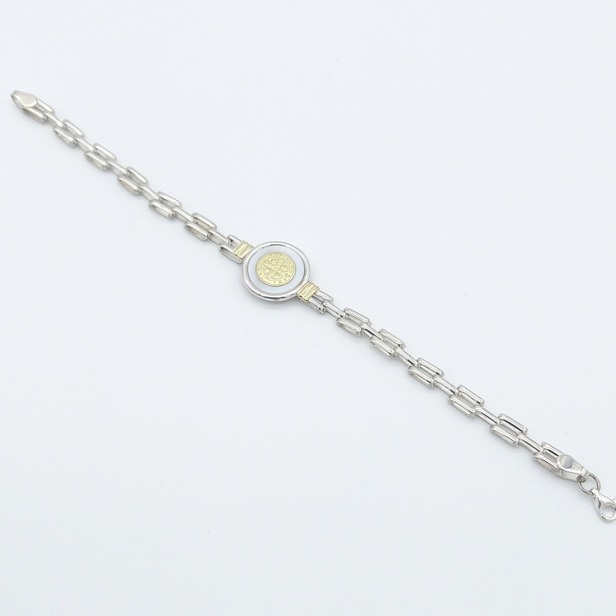 Pulsera de plata 925 y double en oro 18 ktes con nácar. 