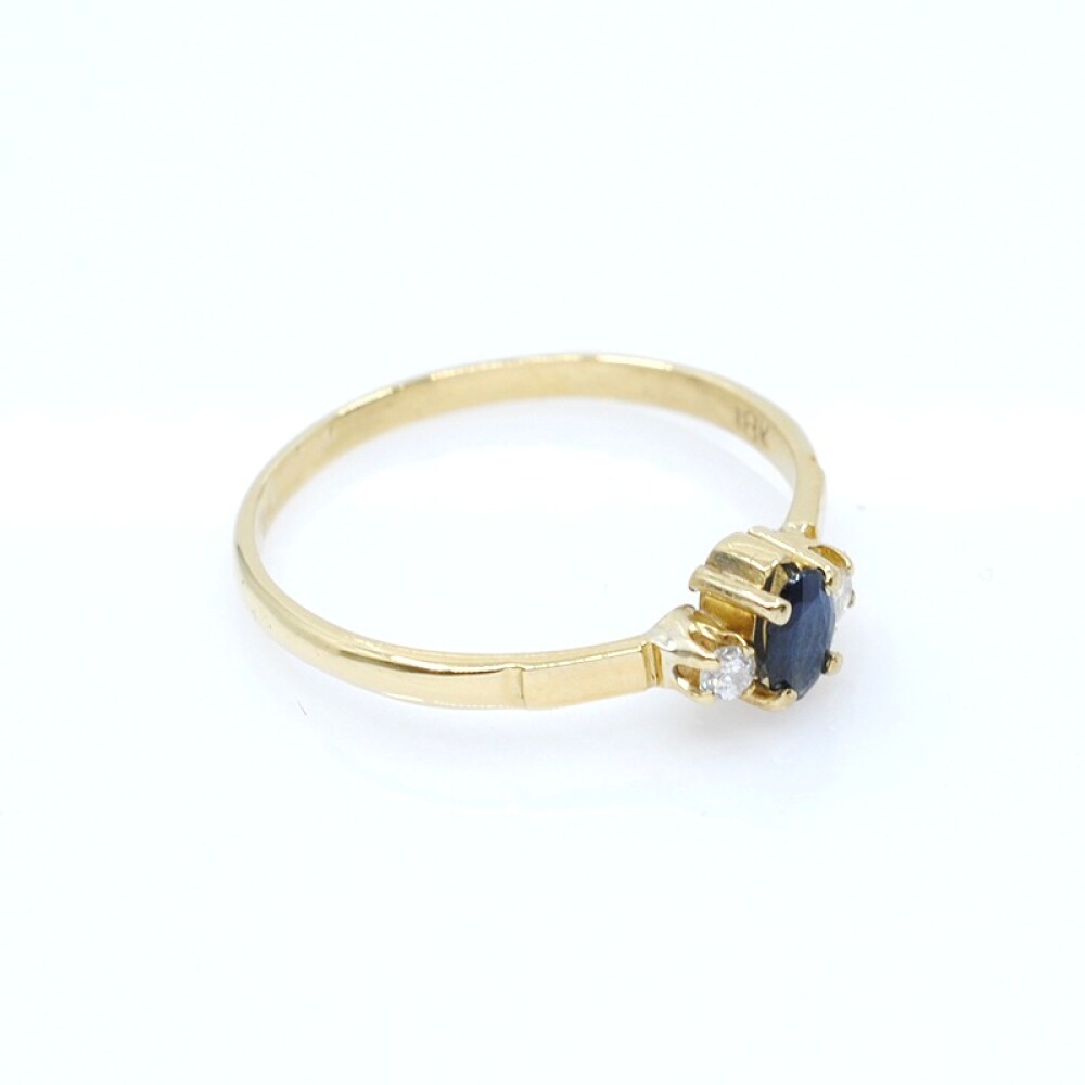 Anillo en oro 18k zafiro y brillantes Anillo en oro 18k zafiro y brillantes