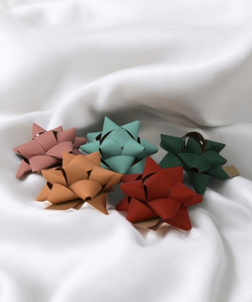 Moño cocarda papel 1.9 cm SURTIDO LISO