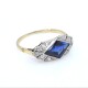 Anillo en oro 18k con piedra de color azul y diamantes Anillo en oro 18k con piedra de color azul y diamantes