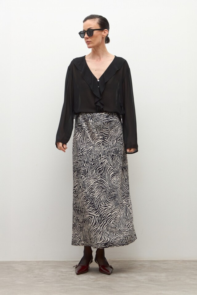 Falda animal print negro