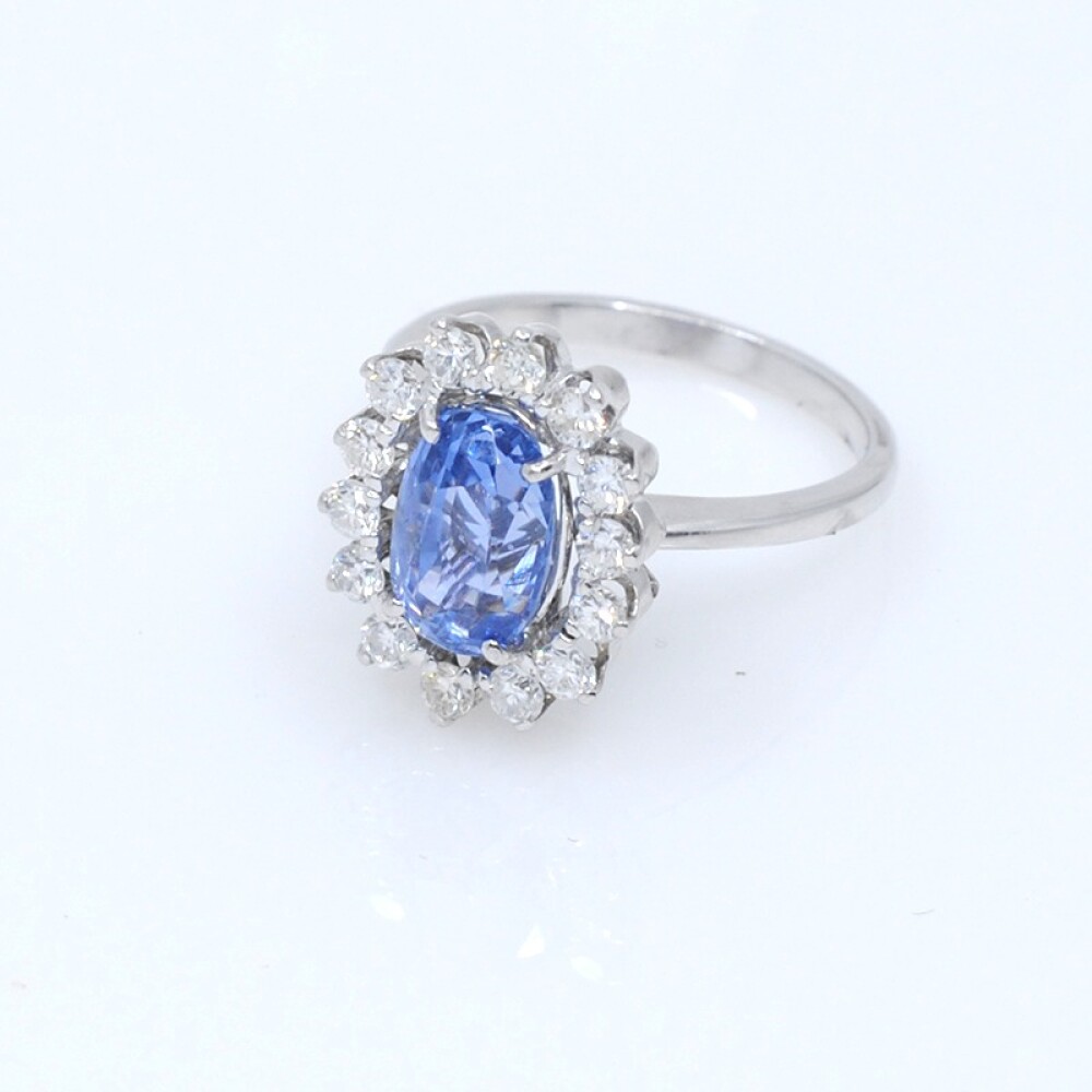 Anillo en oro 18k blanco , brillantes y zafiro Anillo en oro 18k blanco , brillantes y zafiro