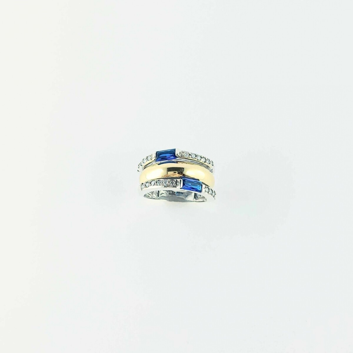 Anillo de plata 925 y double en oro 18 ktes con circonias. 