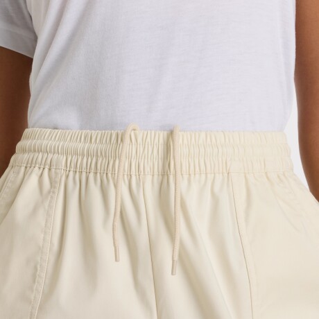 Panrtalón New Balance de Dama - Utility Pant - WP51501LIN BEIGE