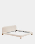 Cama desenfundable Odina bouclé crudo y patas de madera maciza de fresno con acabado tono nogal para colchón de 180 x 200 cm acabado tono nogal para colchón de 180 x 200 cm