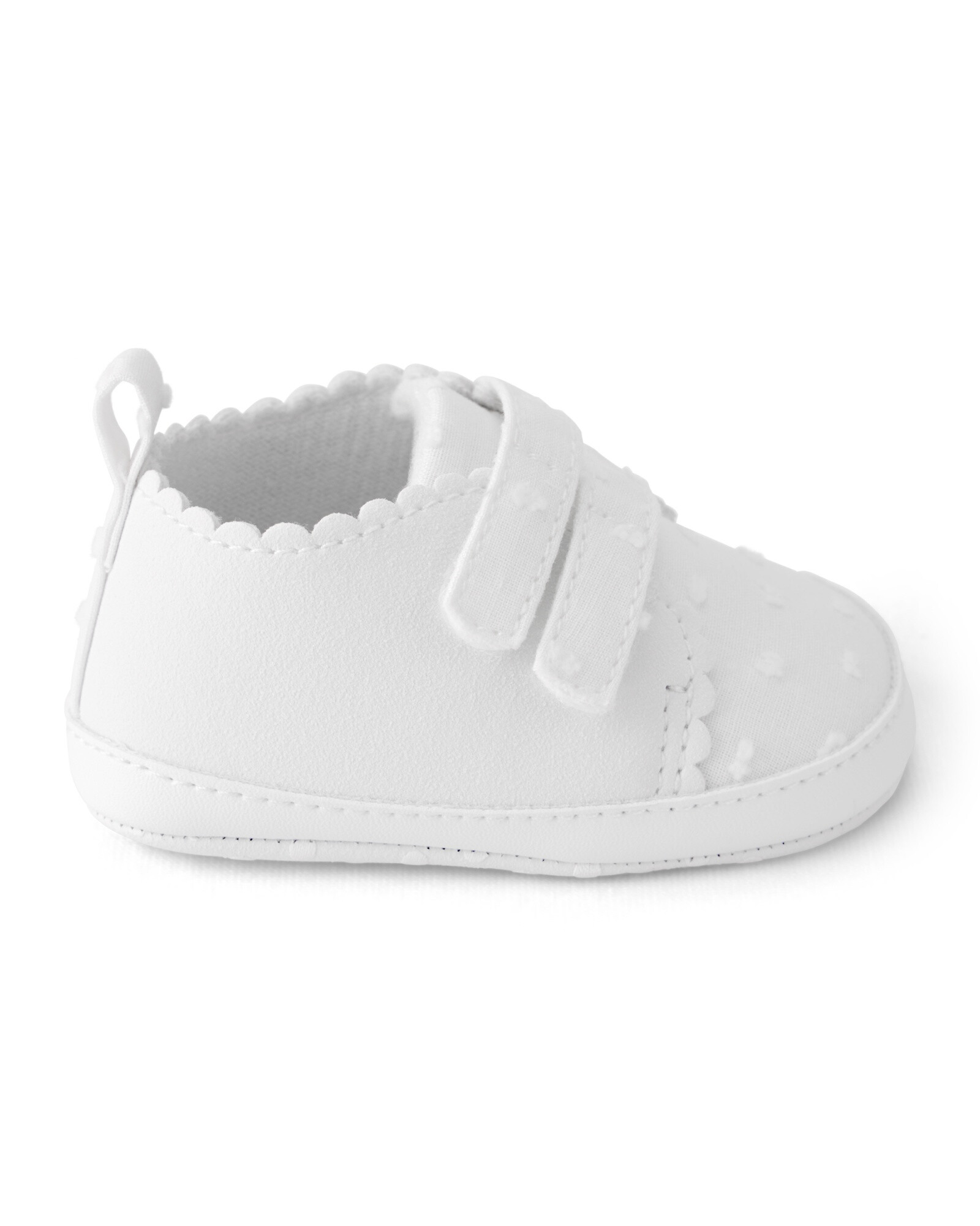 Zapatitos blancos, con velcro, bordes festoneados y lunares bordados Sin color