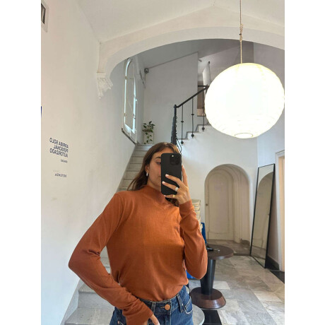 Top Adina Tan