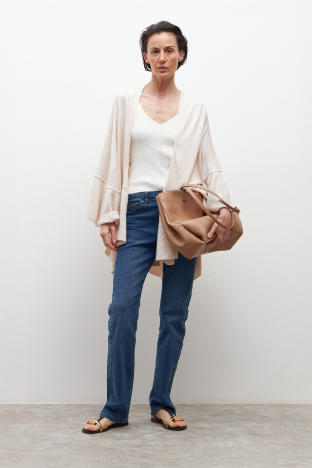 Capa tejida con volados crudo