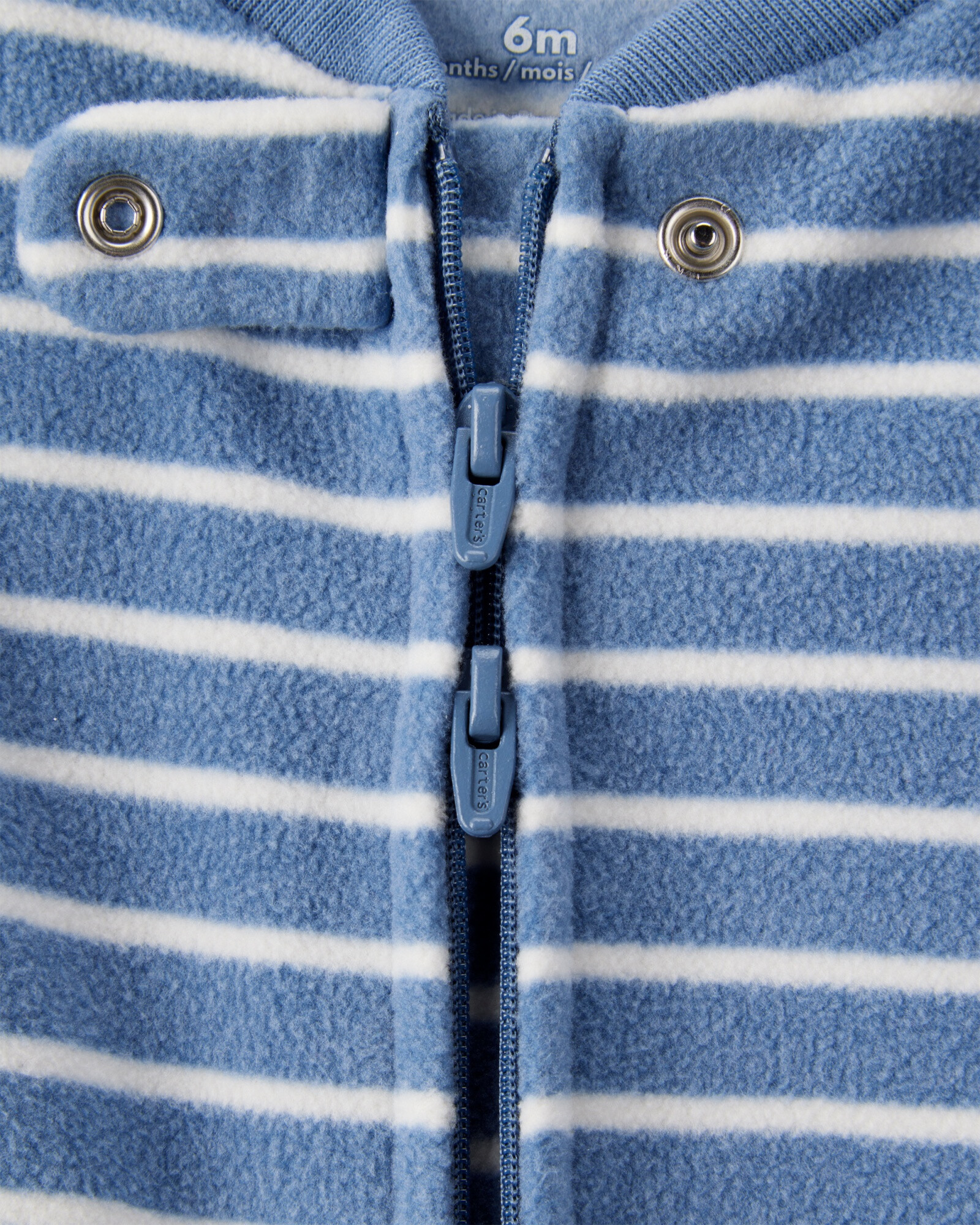 Pijama una pieza de micropolar, con pie, estampa dino Sin color