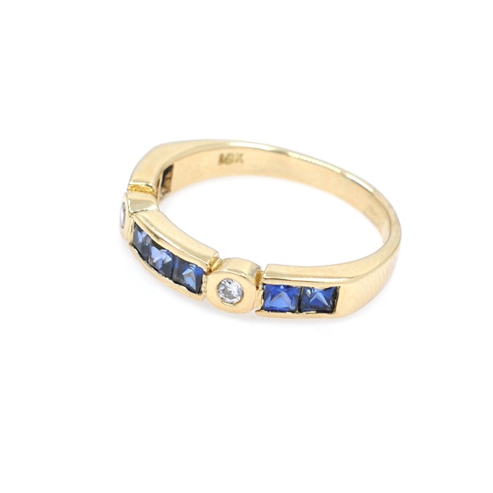 Anillo en oro 18k con zafiros azules carré y 2 brillantes Anillo en oro 18k con zafiros azules carré y 2 brillantes