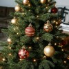 Set x50 chirimbolos 4 cm para árbol de navidad - Rojo y dorado Set x50 chirimbolos 4 cm para árbol de navidad - Rojo y dorado
