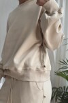 Buzo redondo Crema