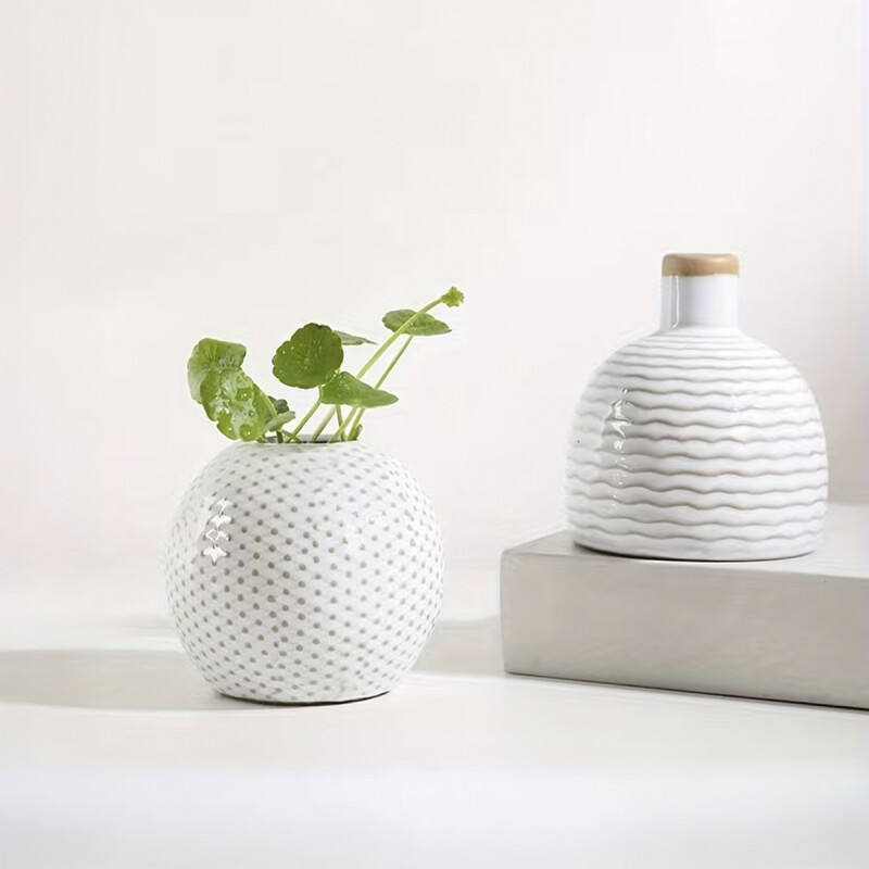 FLORERO DE RED CIRCULAR CERAMICA 9.5x9.5x8CM NATURAL FLORERO DE RED CIRCULAR CERAMICA 9.5x9.5x8CM NATURAL