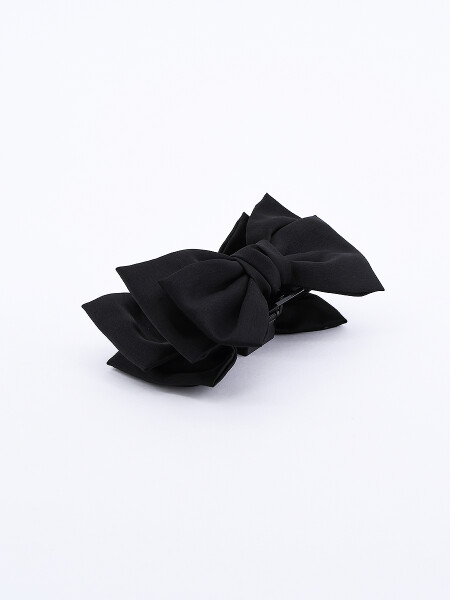 BROCHE CON MOÑO NEGRO