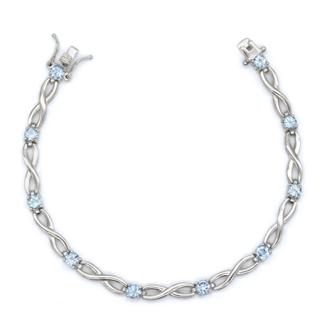 Pulsera de plata 925 rodinada con topacio celeste. Pulsera de plata 925 rodinada con topacio celeste.