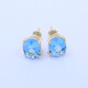 Caravanas oro 18k con topacios azules oval engarce 4 puntas. Caravanas oro 18k con topacios azules oval engarce 4 puntas.
