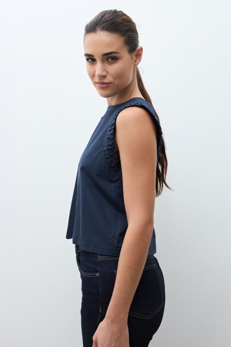 Blusa con sisa drapeada azul marino