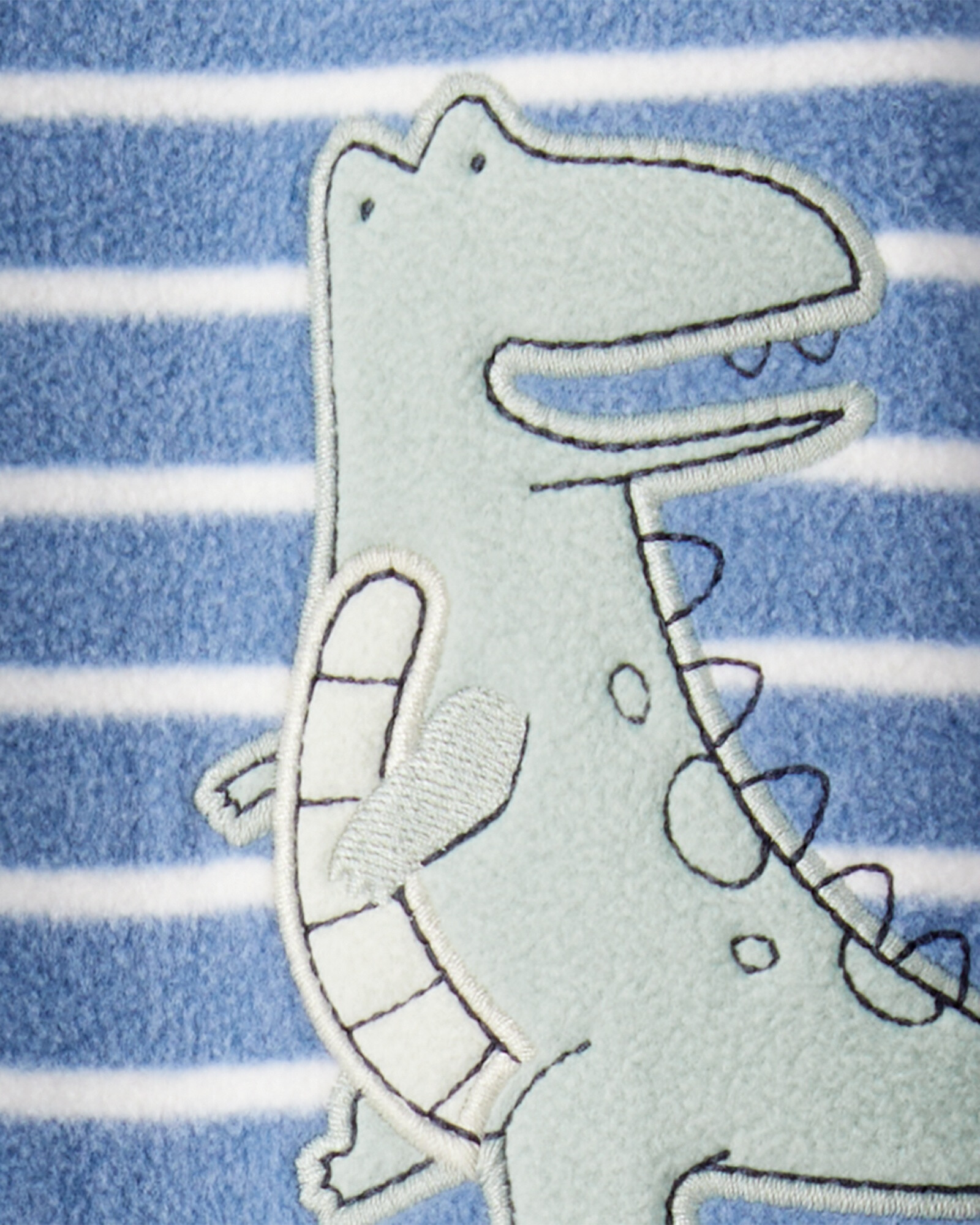 Pijama una pieza de micropolar, con pie, estampa dino Sin color