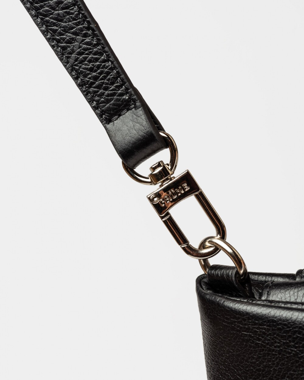 Bandolera Curve en cuero graneado Negro