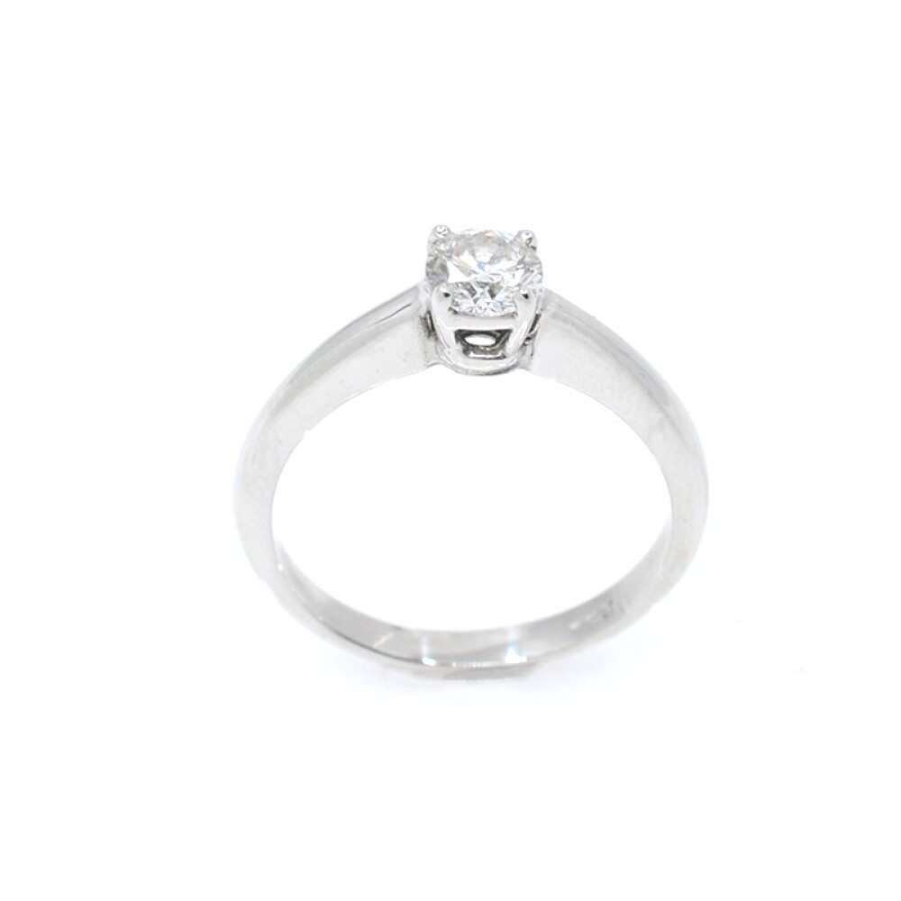 Anillo solitario en oro 18k y brillante Anillo solitario en oro 18k y brillante