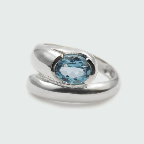 Anillo Ivy de plata 925 con topacio azul. Anillo Ivy de plata 925 con topacio azul.