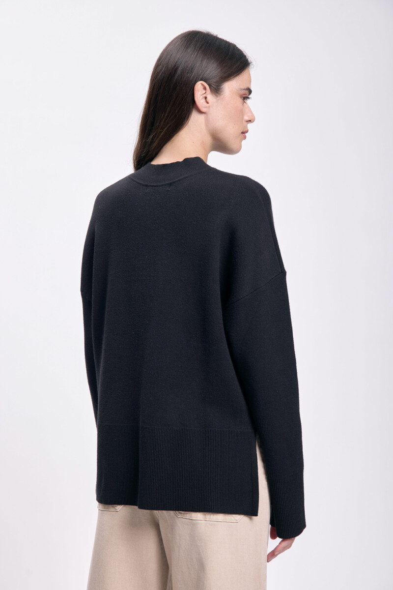 Polera punto con corte lateral Negro